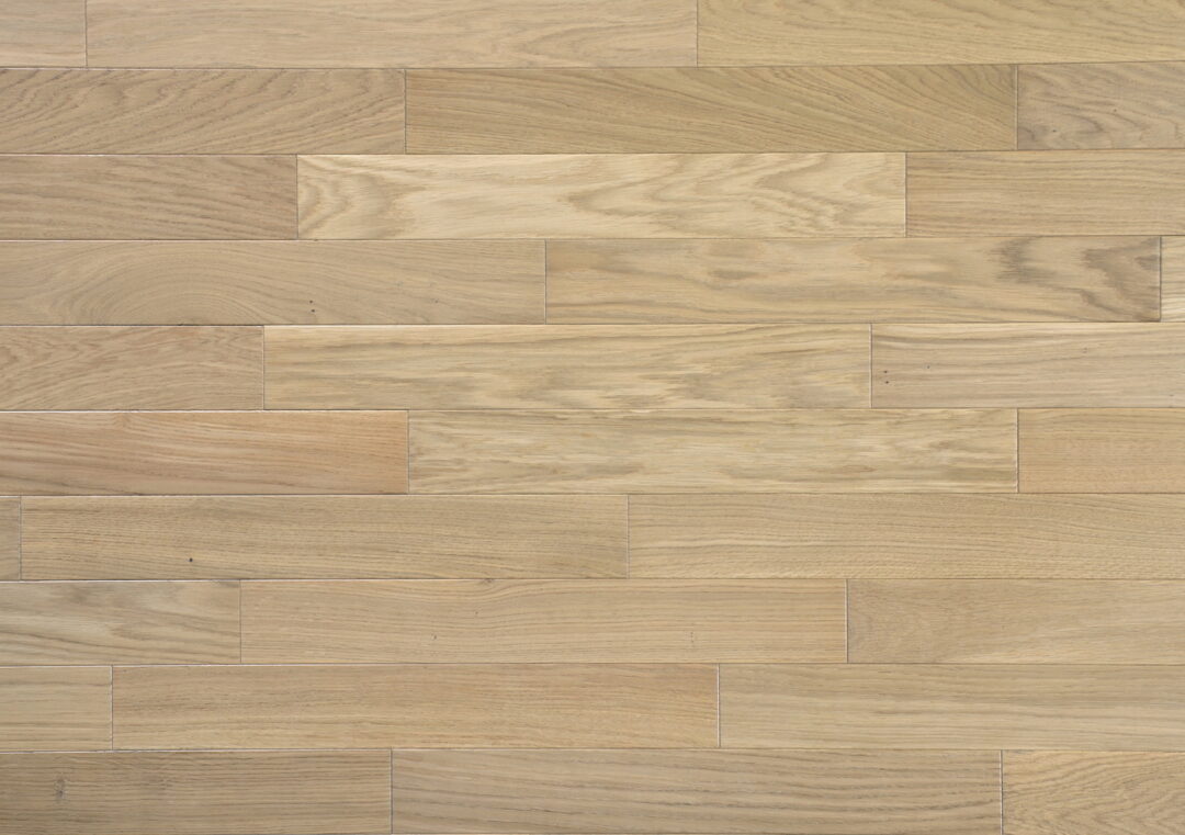 Atacama oak parquet arranged in a ship pattern (irregular brick)